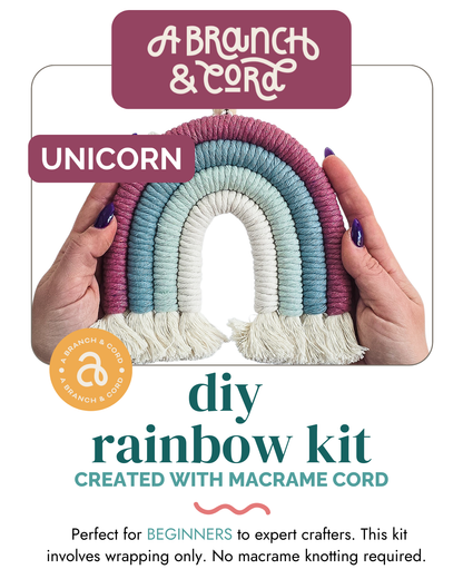 Hands holding a Rainbow Macrame kit