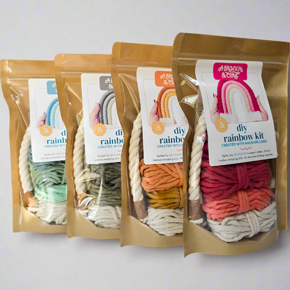 Display of four diy rainbow kits on white background